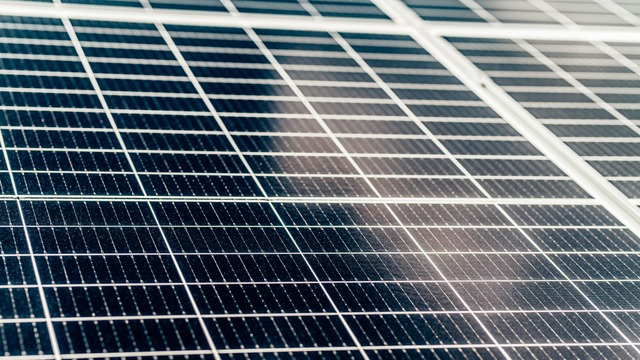 close view of Solar panels reflecting the sky