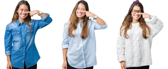 Collage of beautiful young woman over isolated background Pointing with hand finger to face and nose, smiling cheerful