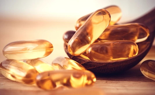 vitamin D and Omega 3 fish oil capsules supplement
