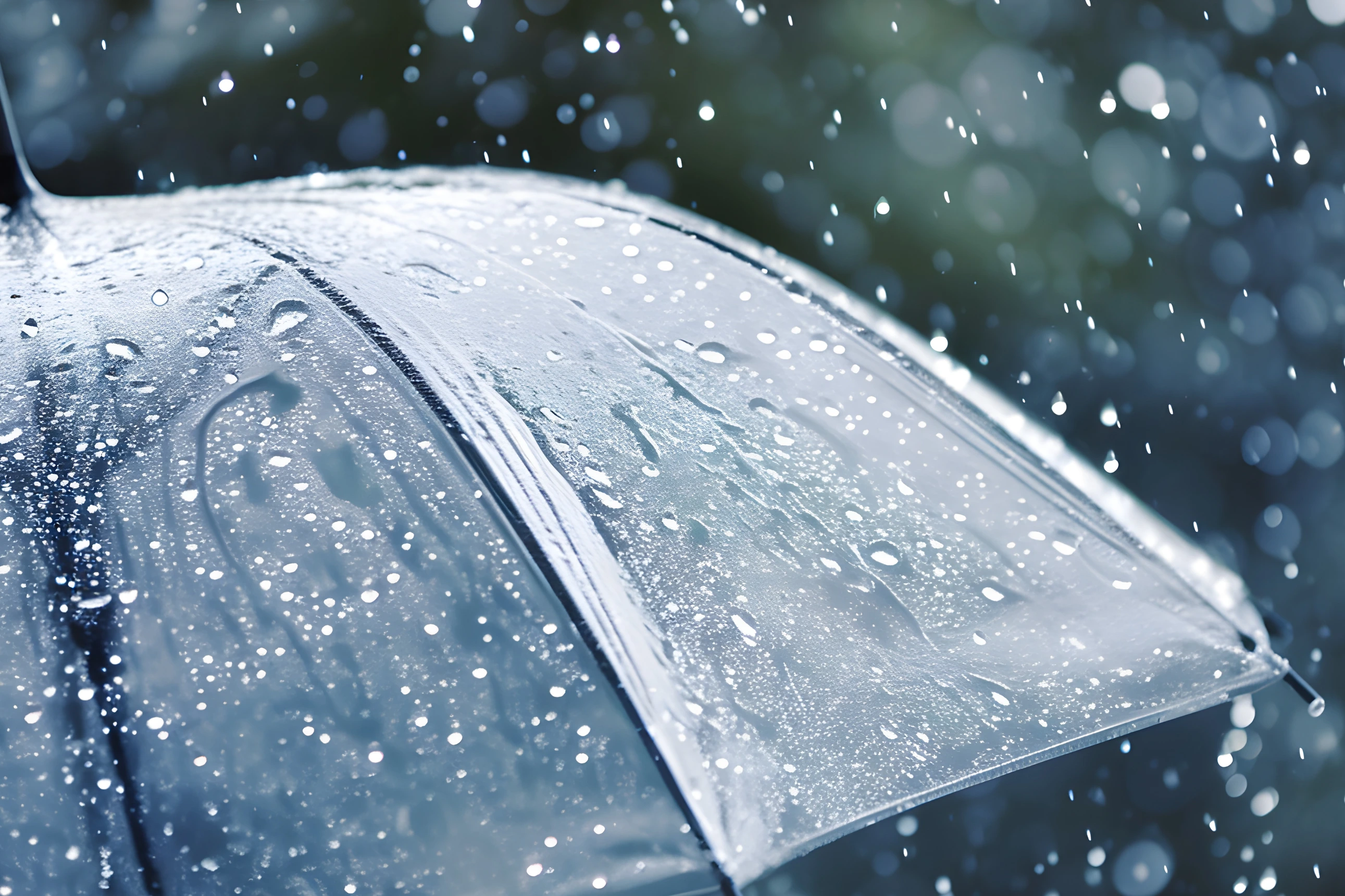 Transparent umbrella under heavy rain against water drops splash background. Rainy weather concept.
