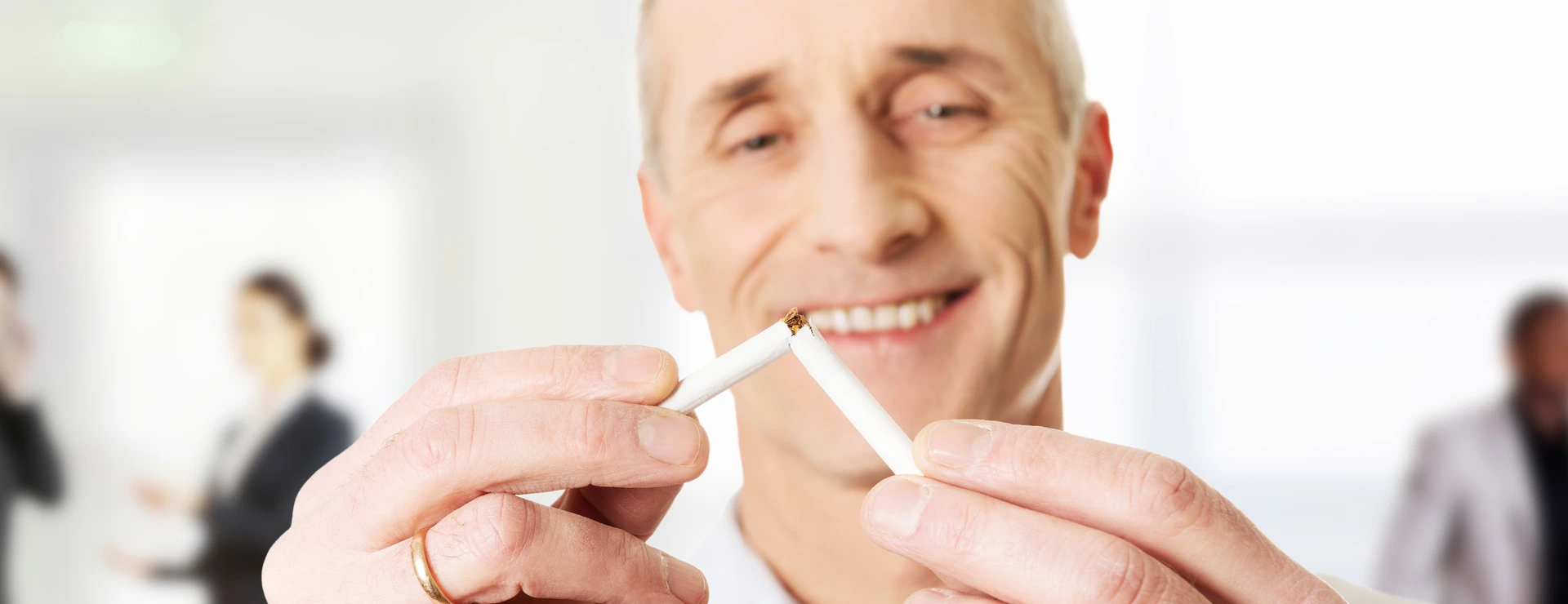 Successful man with broken cigarette