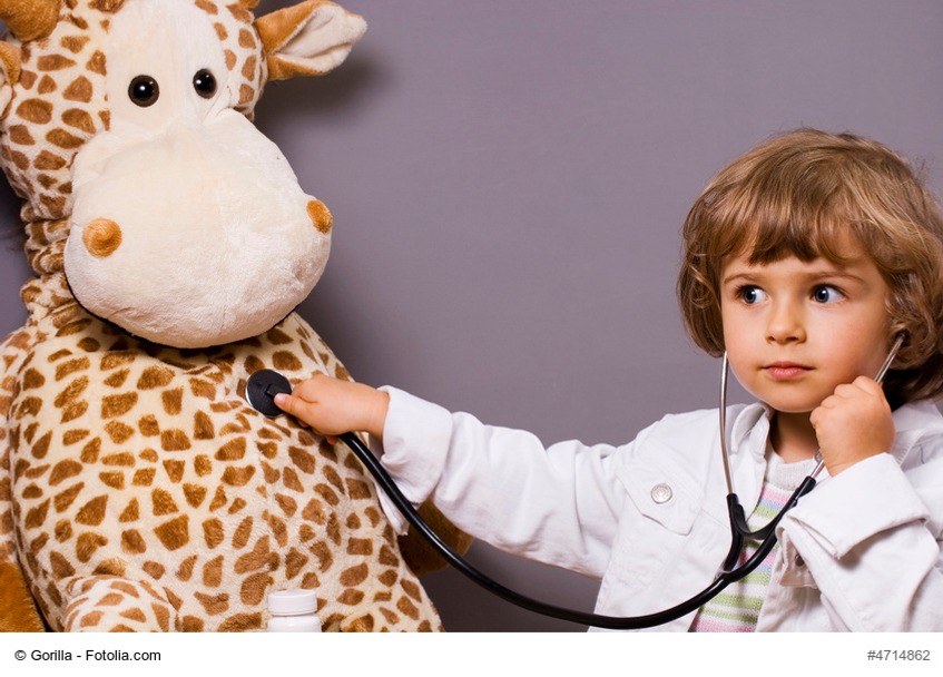 beautiful four years old playing with stethoscope
