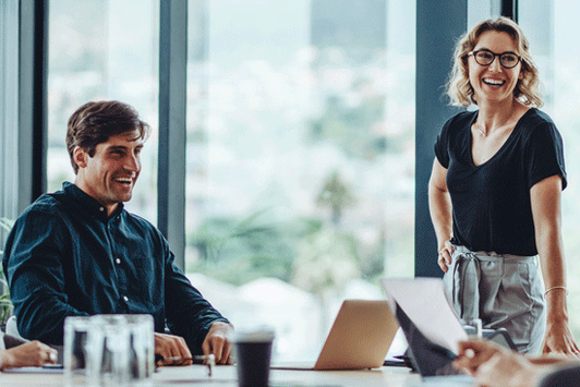 Business people having casual discussion during meeting