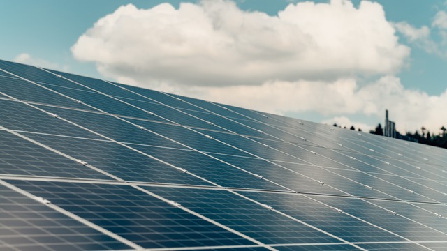 Solar panels beneath blue sky