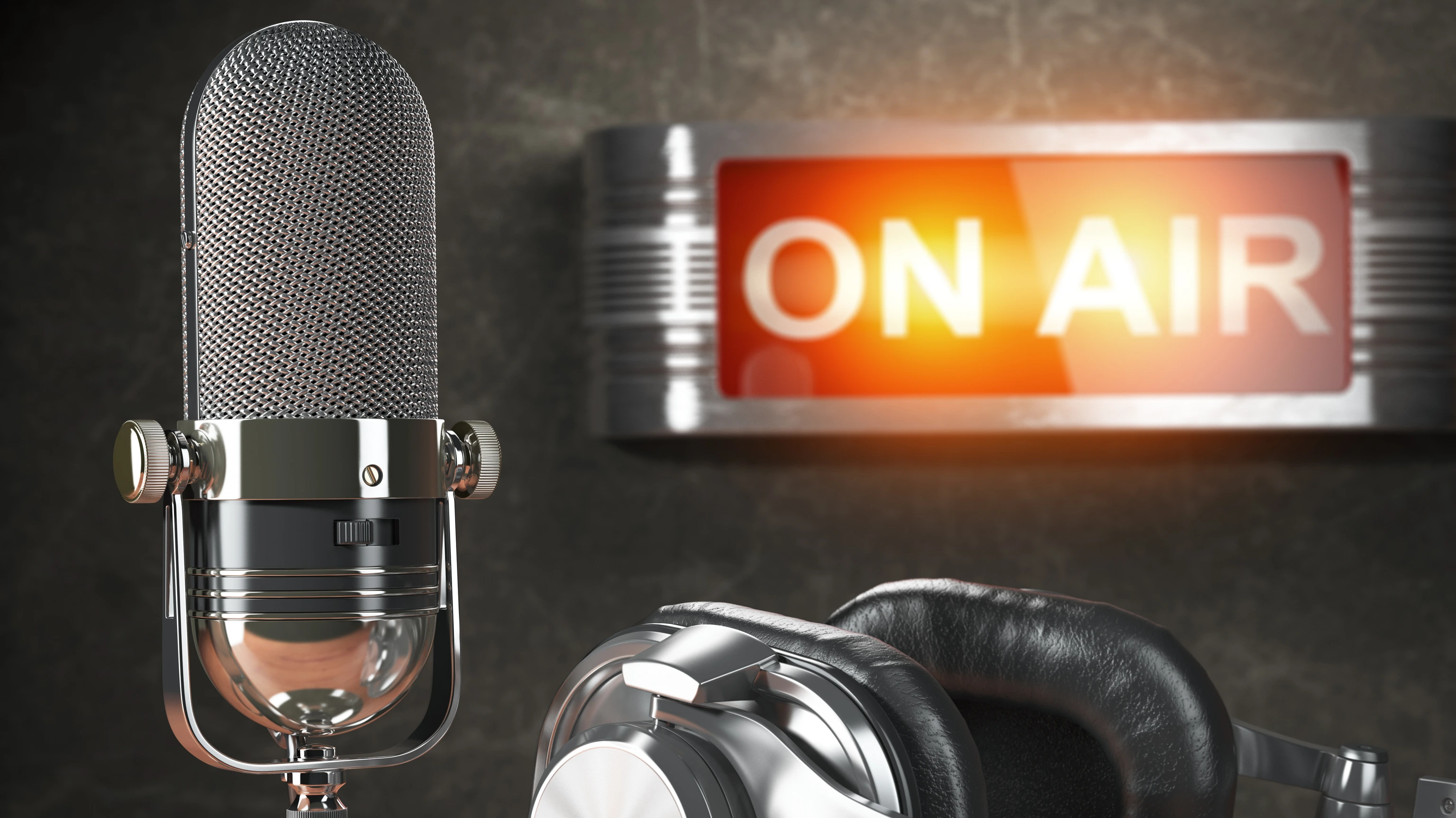 Vintage microphone  and headphones with signboard on air