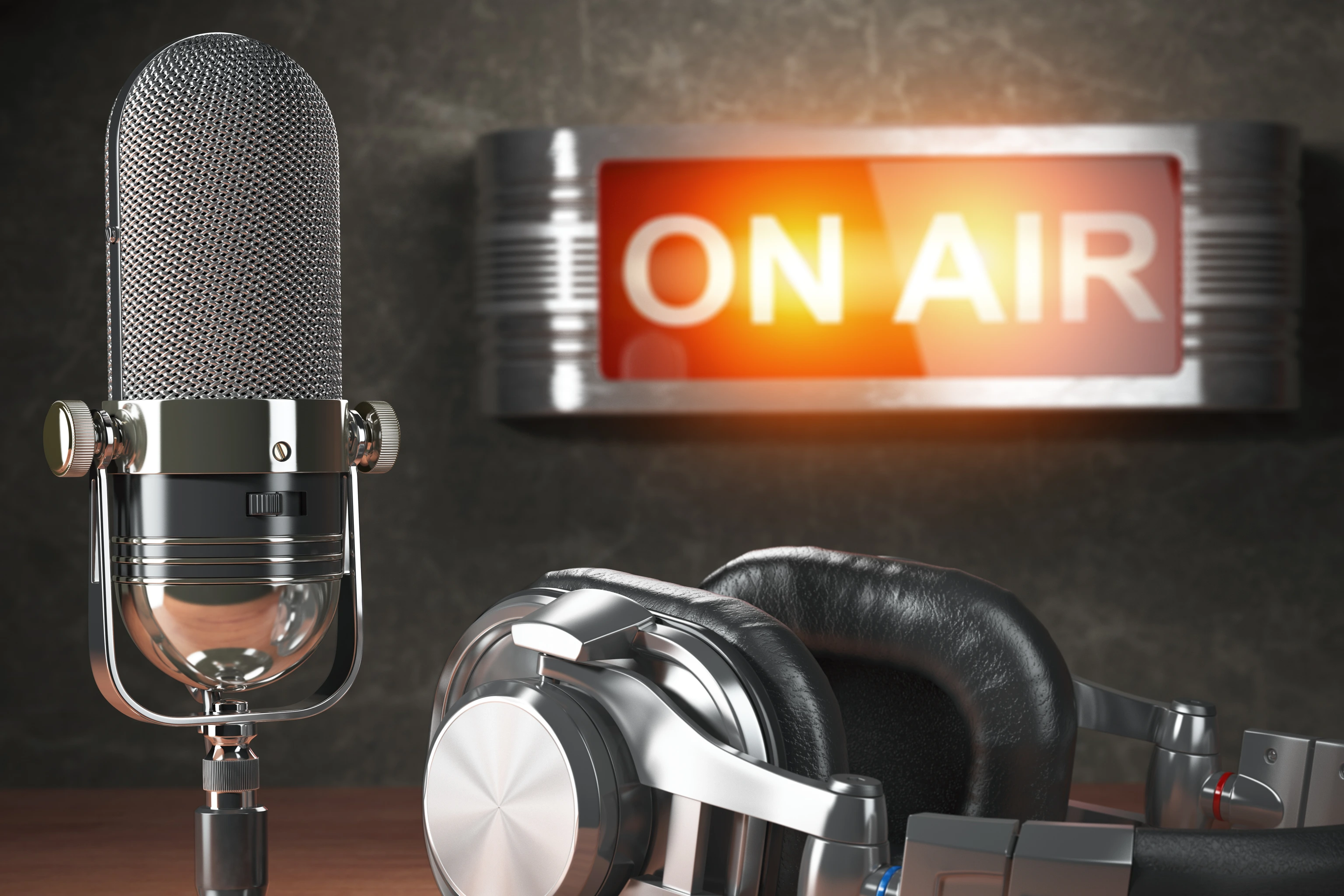 Vintage microphone  and headphones with signboard on air