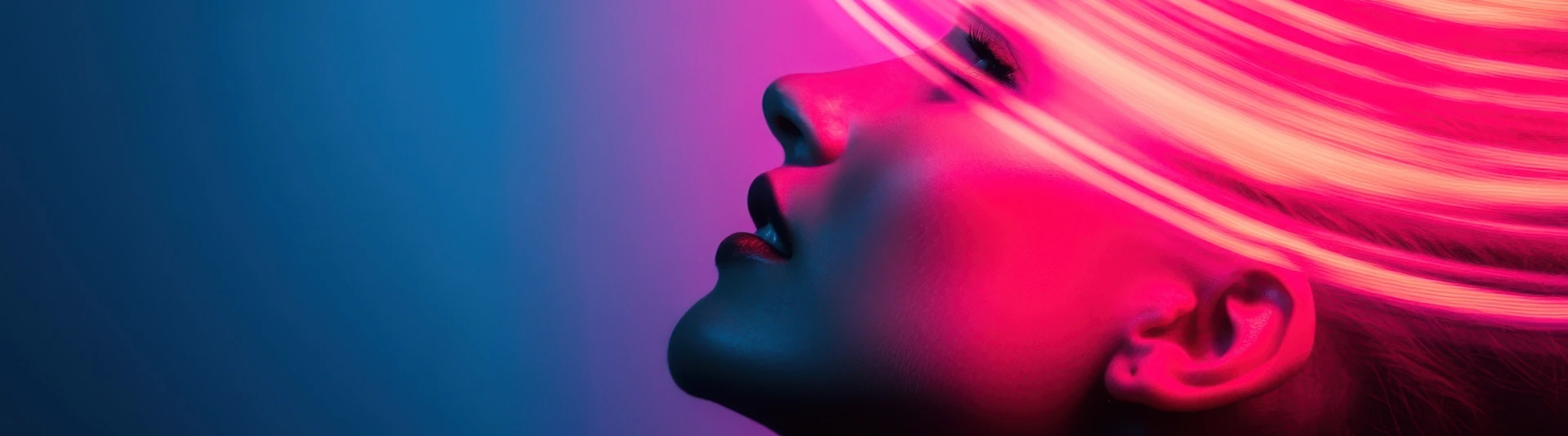 Woman posing under neon lights with blue and purple background
