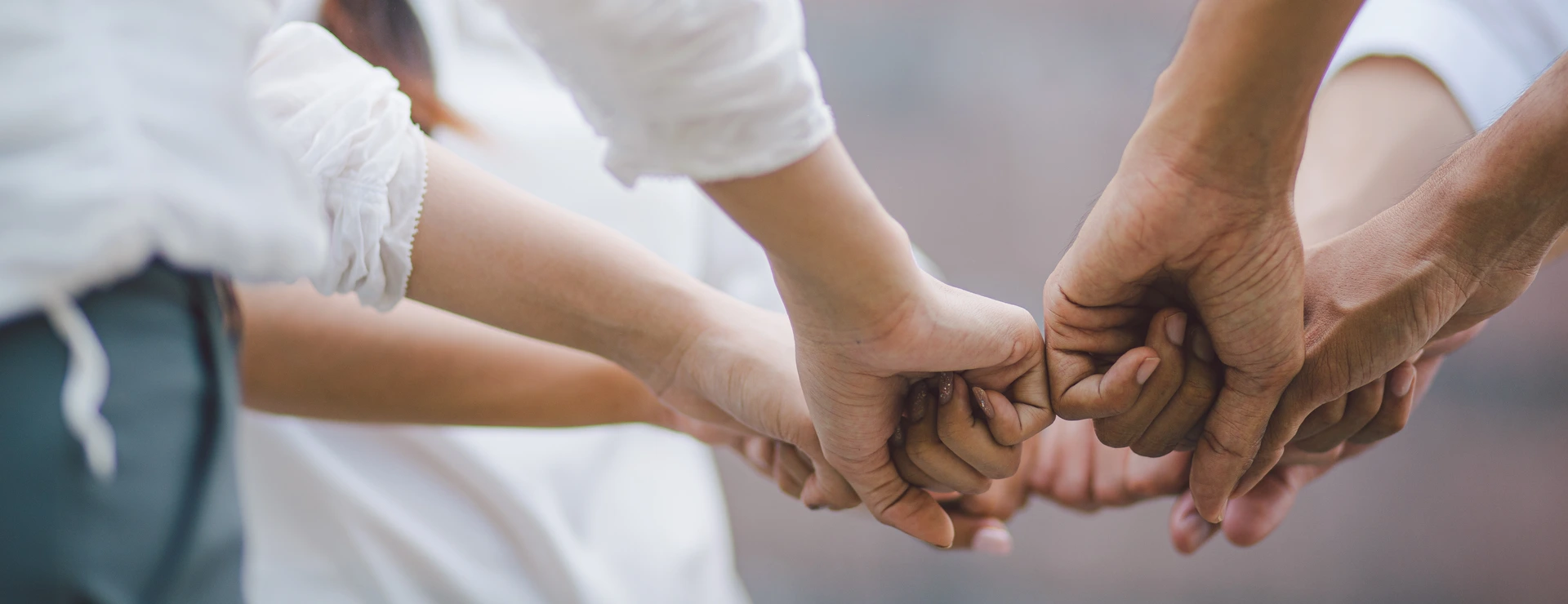 Panoramic teamwork business join hand together concept, Business team standing hands together, Volunteer charity work. People joining for cooperation success business.