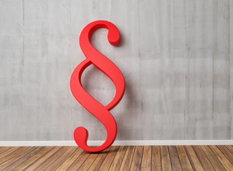 Roter Paragraph als Symbol für Rechte am Arbeitsplatz in Bereich Allergie