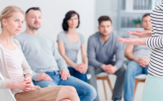 Woman during sharing session