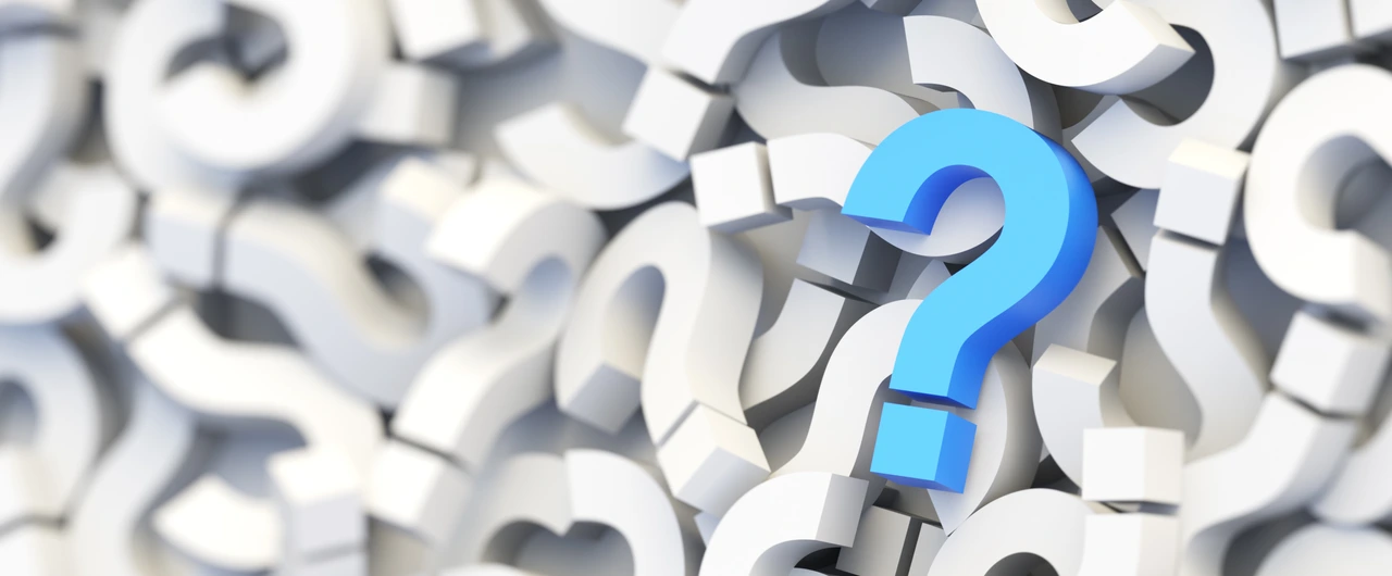 Blue question mark on a background of white signs. 3D Rendering