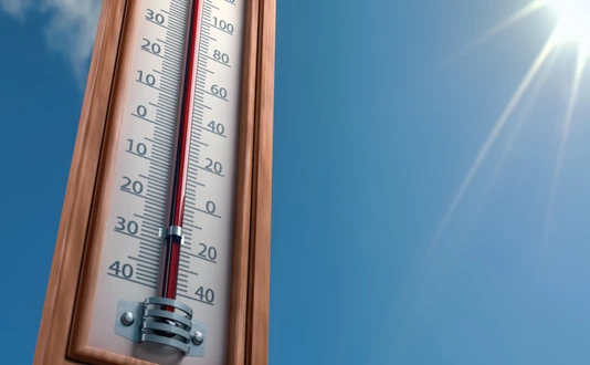 Outdoor thermometer indicating extreme high temperature