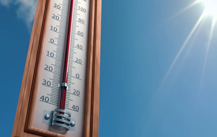 Outdoor thermometer indicating extreme high temperature