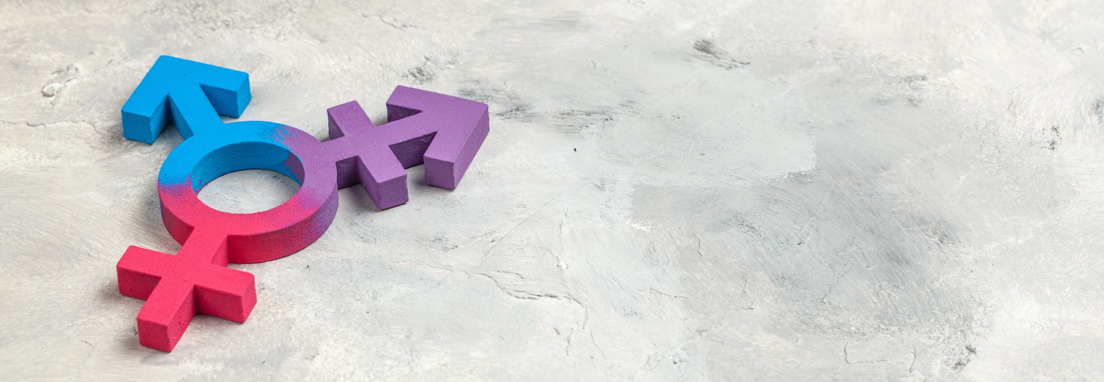 Transgender symbol and gender symbol of man and woman on a gray background.