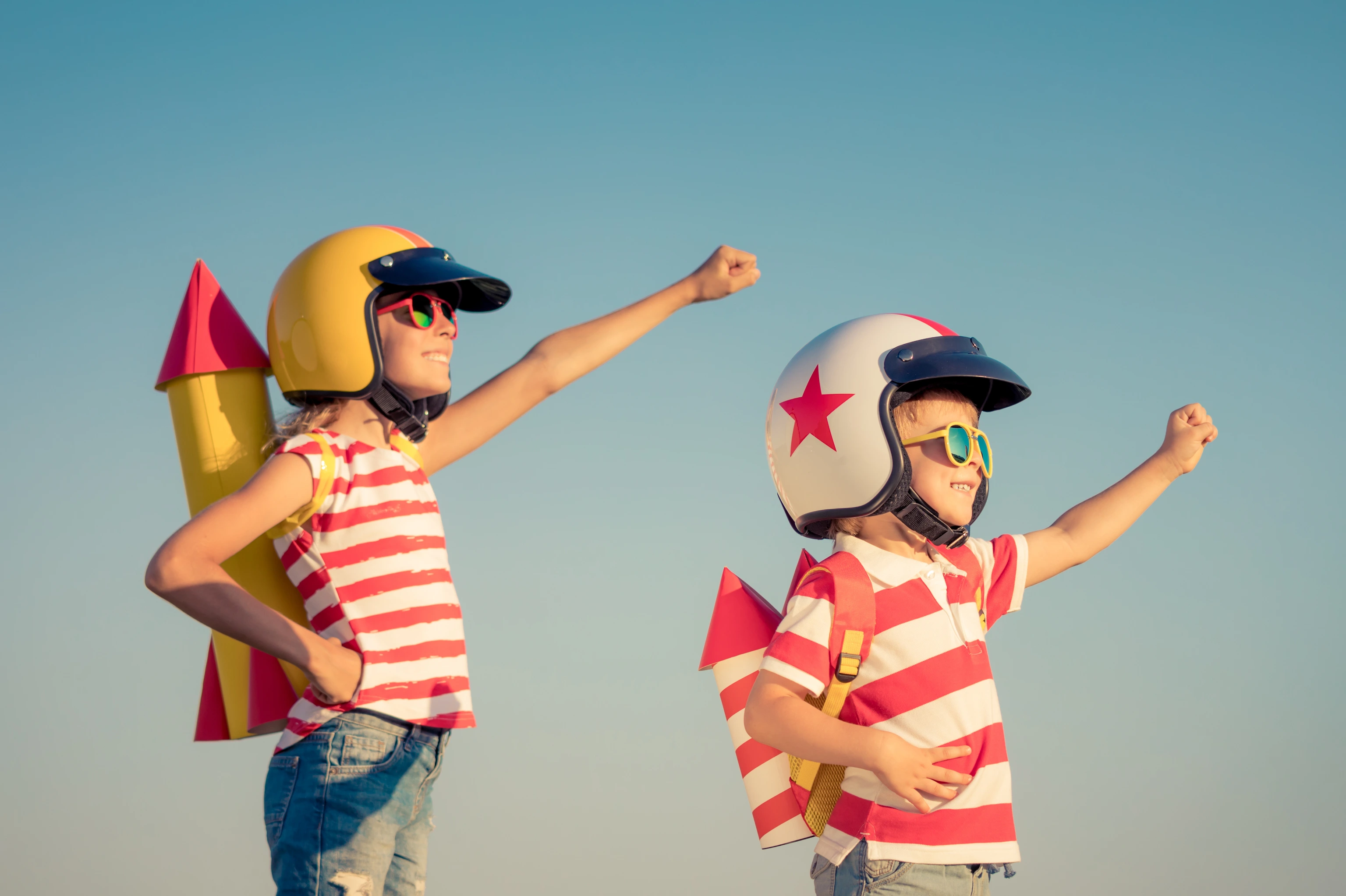 Happy children playing outdoor in summer