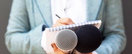 Female reporter with microphone