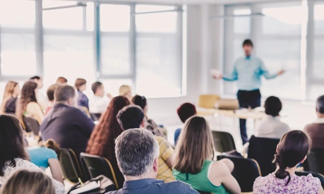 Speaker Giving a Talk at Business Meeting.