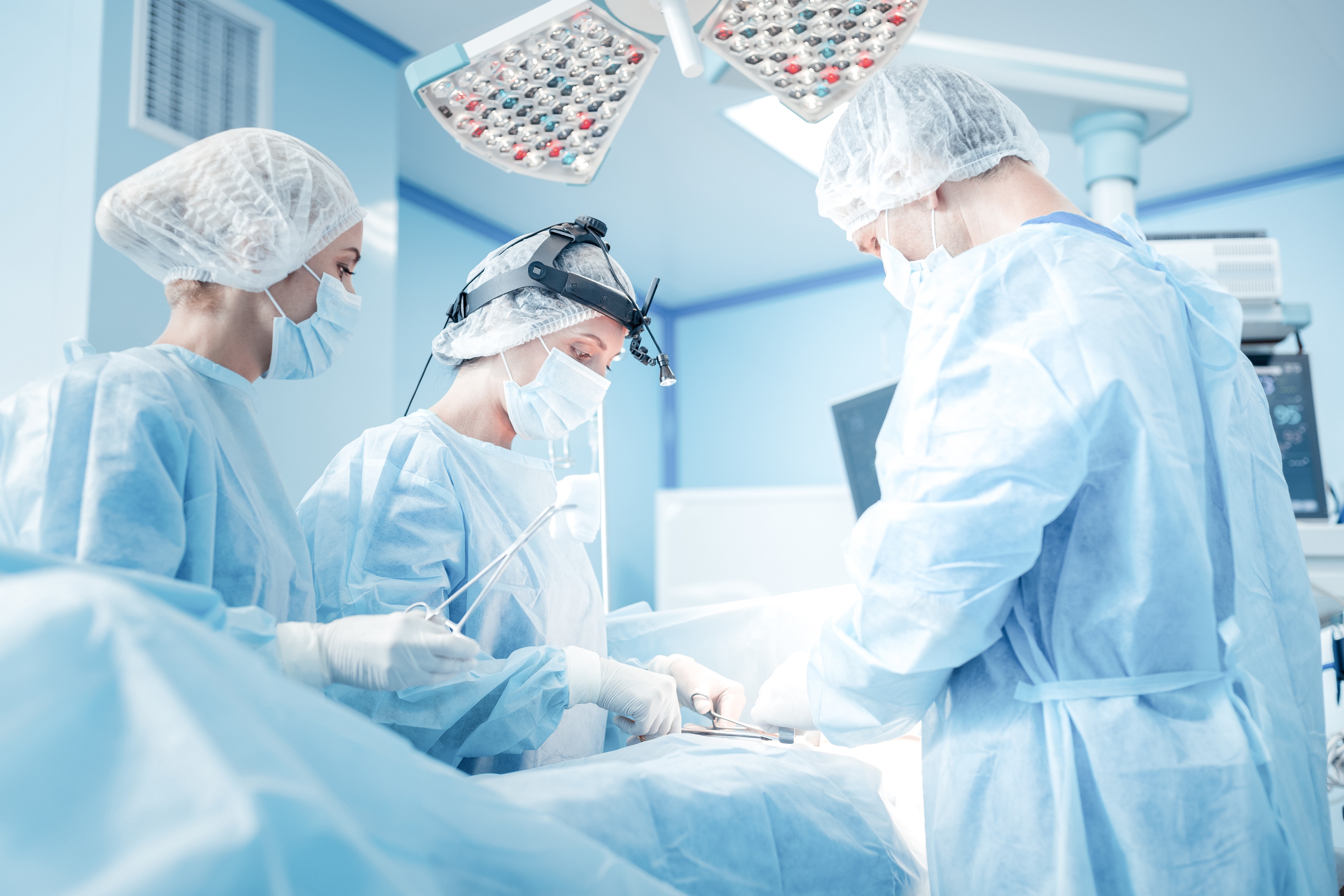 Professional intelligent surgeons saving patients life