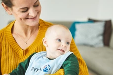 SINT1A Kind mit Baby Andreas Pfohl, NOZY Films GmbH