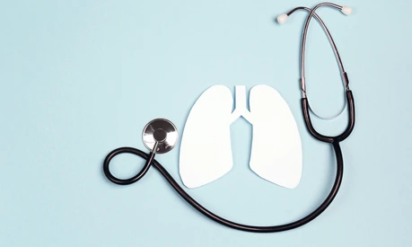 Lungs symbol with stethoscope on blue background. World Tuberculosis Day.