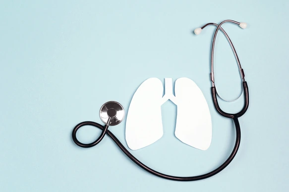 Lungs symbol with stethoscope on blue background. World Tuberculosis Day.