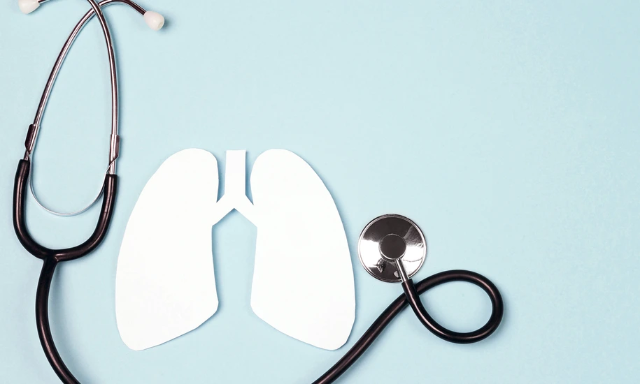 Lungs symbol with stethoscope on blue background. World Tuberculosis Day.