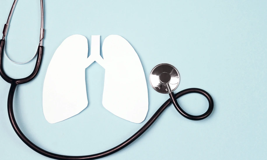 Lungs symbol with stethoscope on blue background. World Tuberculosis Day.