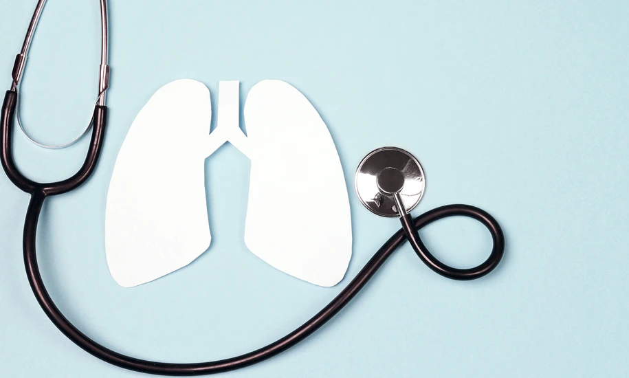 Lungs symbol with stethoscope on blue background. World Tuberculosis Day.