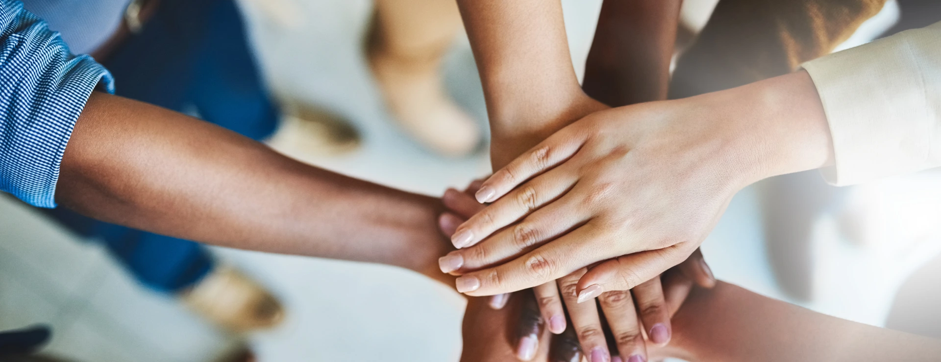 Together we can do great things. Cropped shot of a group of businesspeople piling their hands on top of each other.