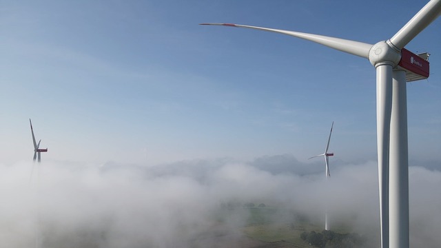 Windmills peaking through the clouds