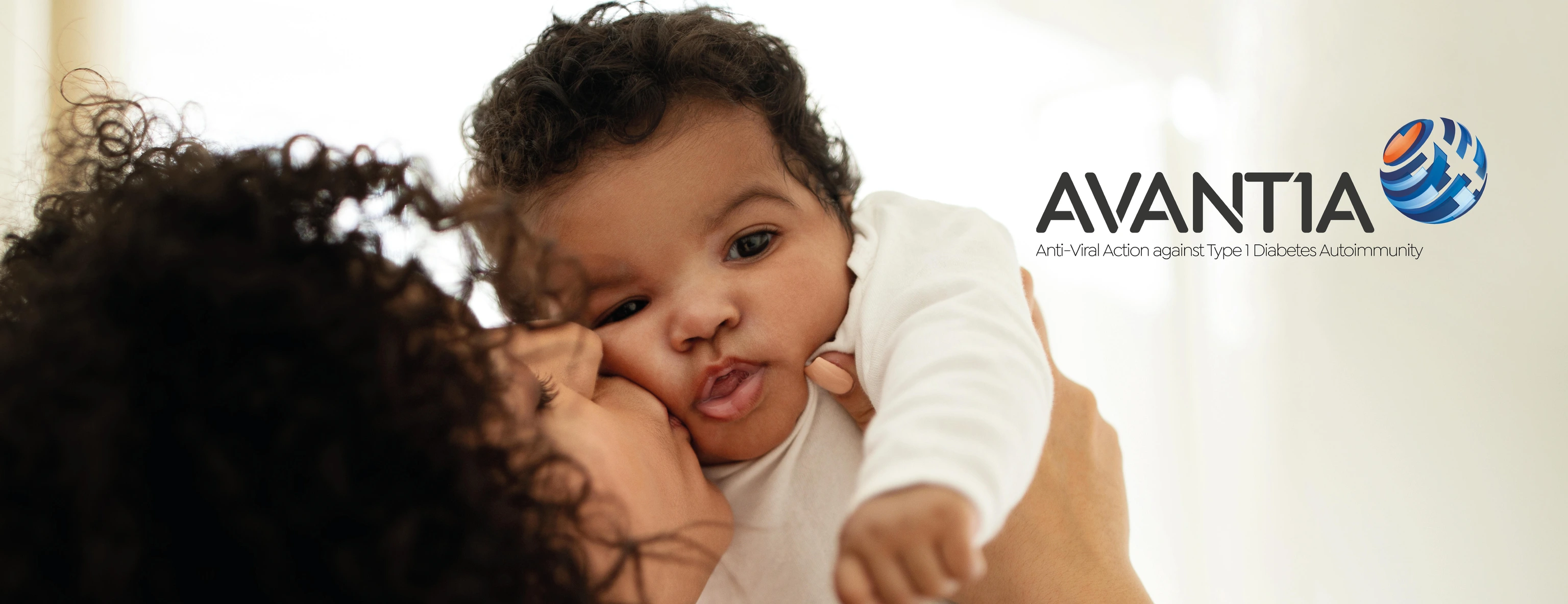 Alias - Happy millennial african american mother kissing little child, enjoy relax together, have fun in bedroom interior