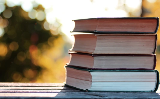autumn book stack wooden outdoor