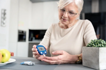 Woman checking blood sugar