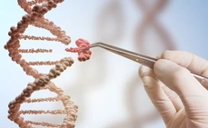 Genetic engineering and gene manipulation concept. Hand is replacing part of a DNA molecule.
