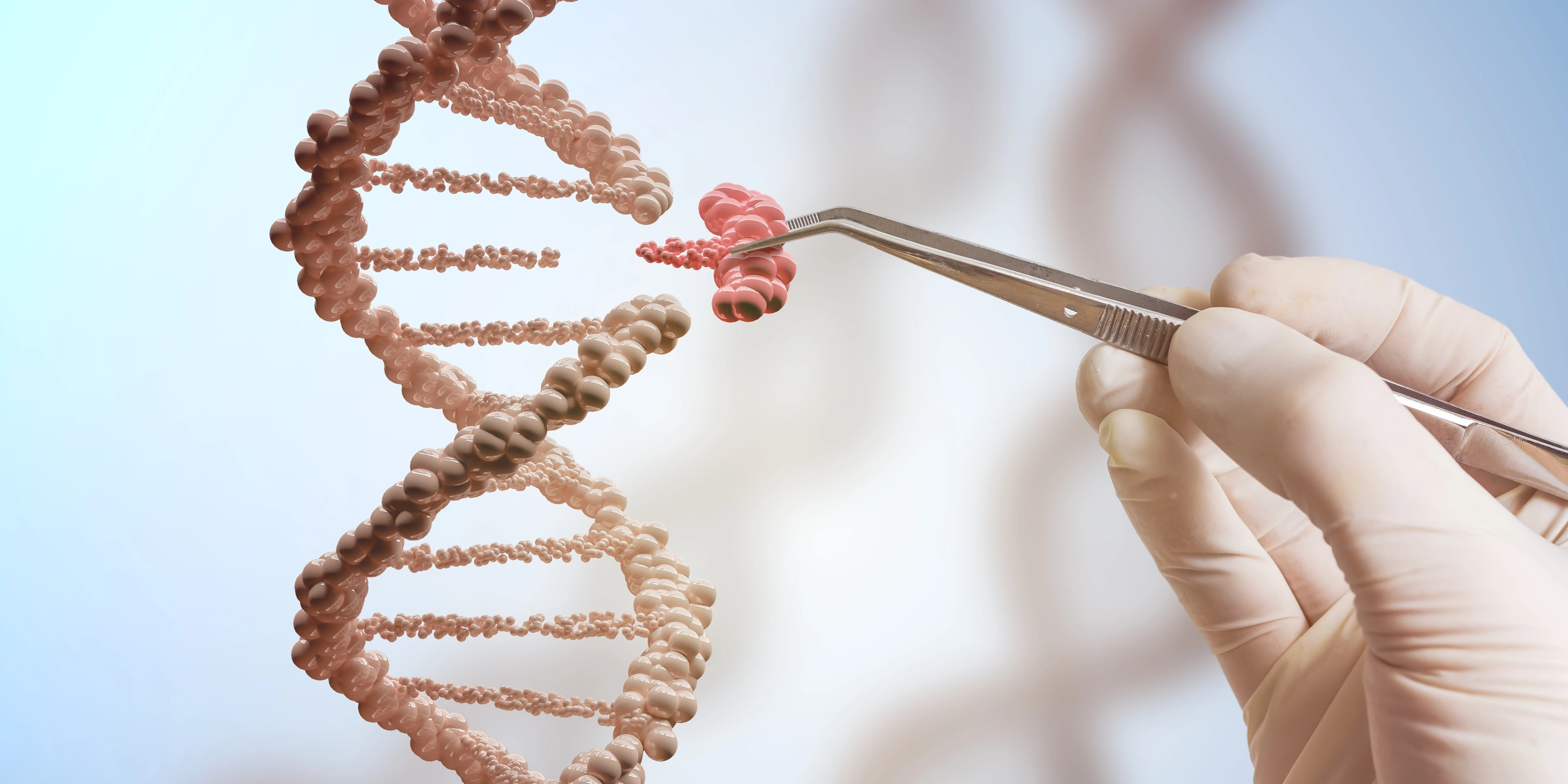 A hand is replacing part of a DNA molecule