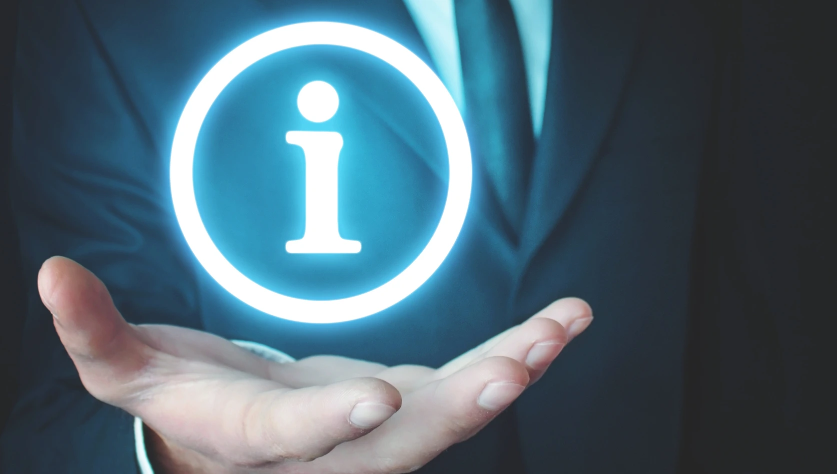 Businessman hand holding Information symbol