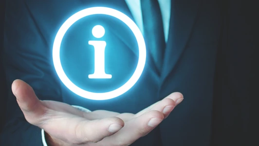 Businessman hand holding Information symbol