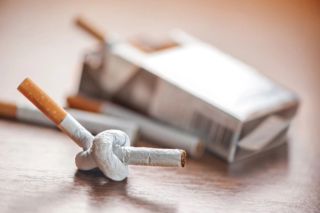 tied cigarette on table closeup