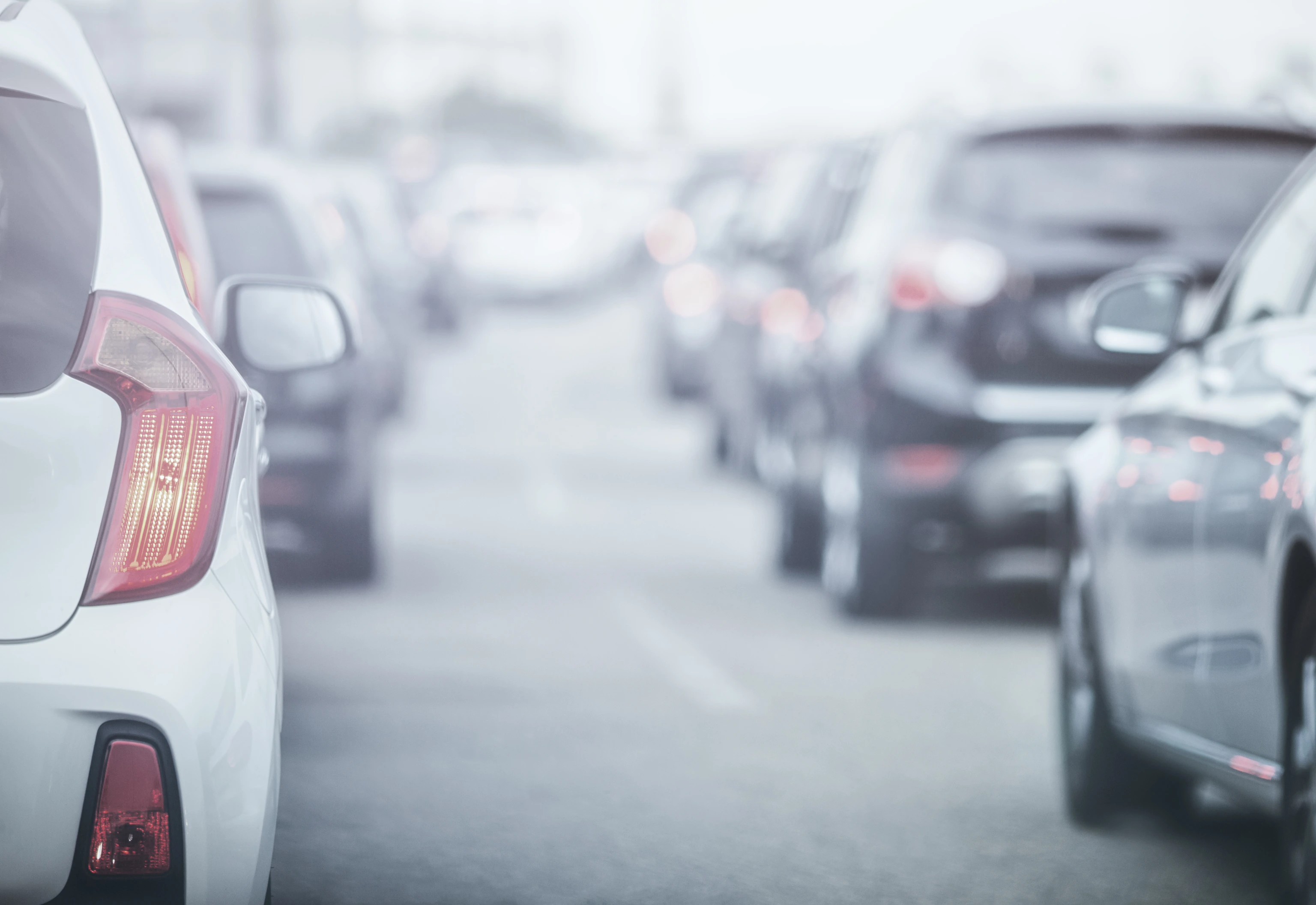 Cars in traffic jams in fog