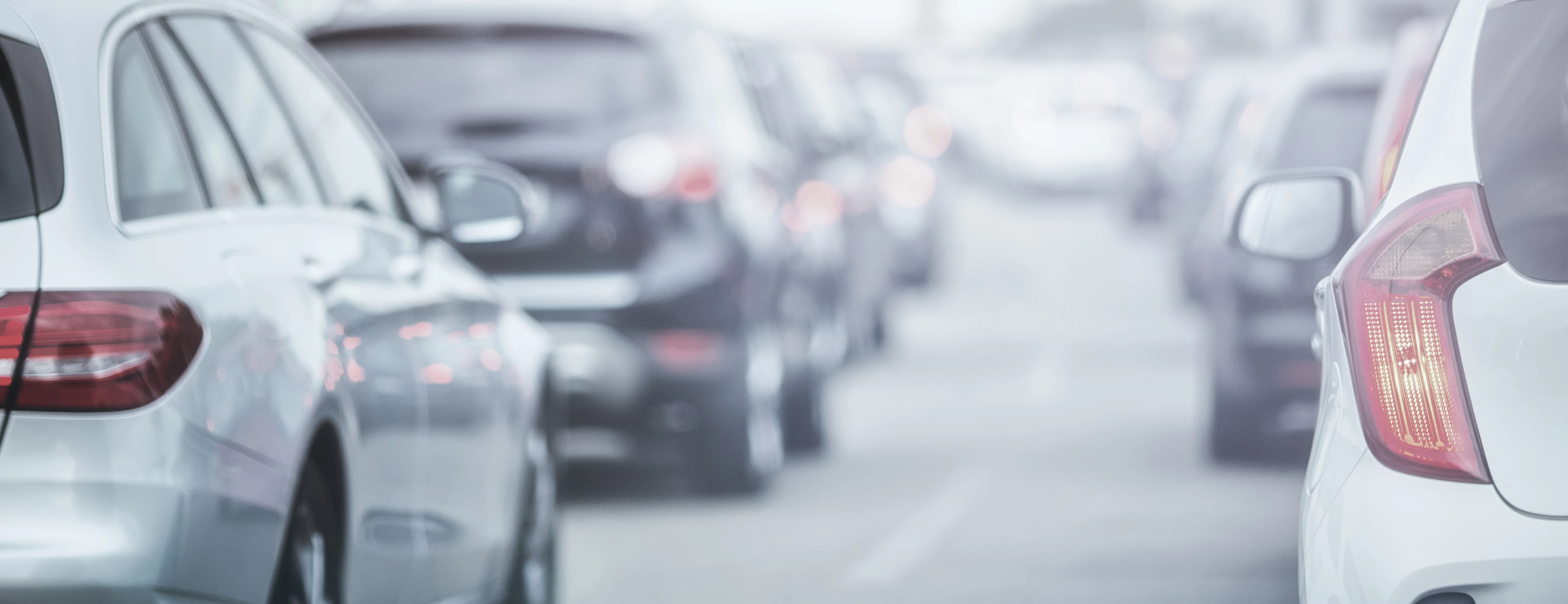 Cars in traffic jams in fog