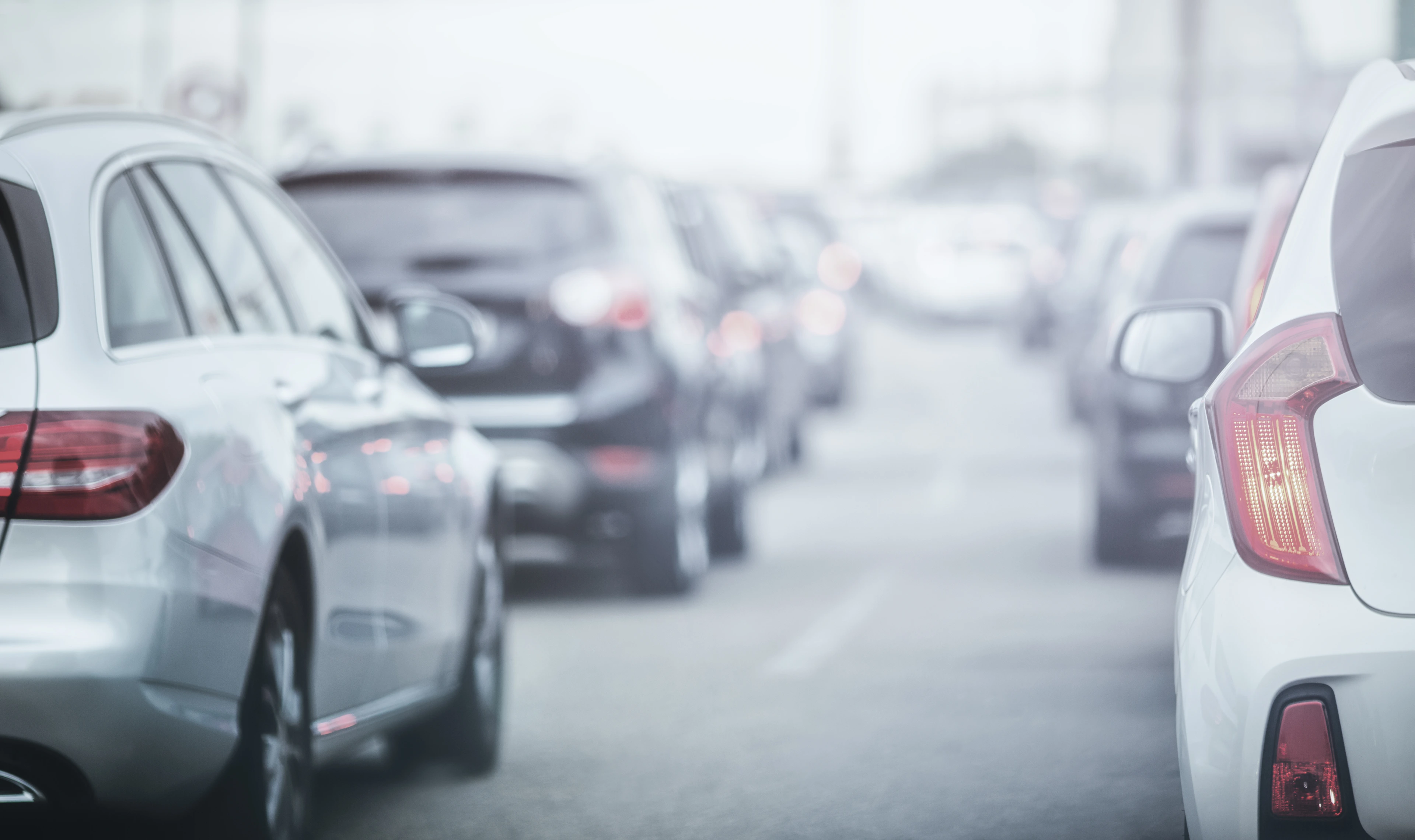 Cars in traffic jams in fog
