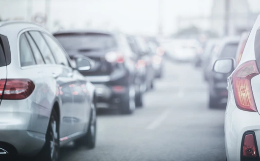 Cars in traffic jams in fog