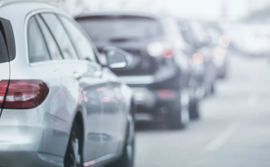 Cars in traffic jams in fog