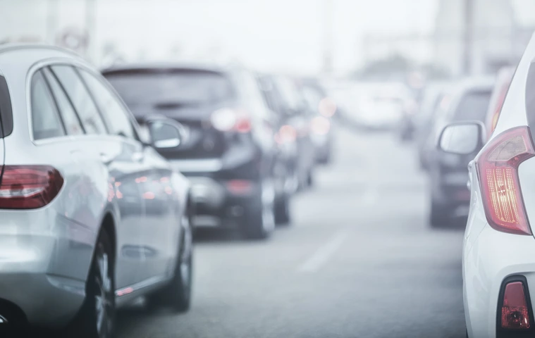 Cars in traffic jams in fog