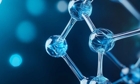 3D representation of insulin protein structure illuminated with a blue glow on a black background_AdobeStock_1073210391