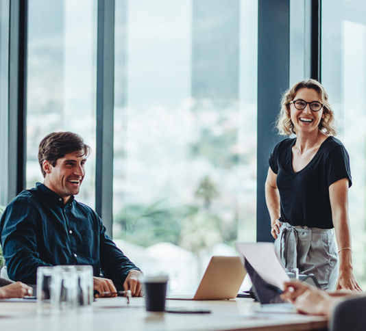 Business people having casual discussion during meeting