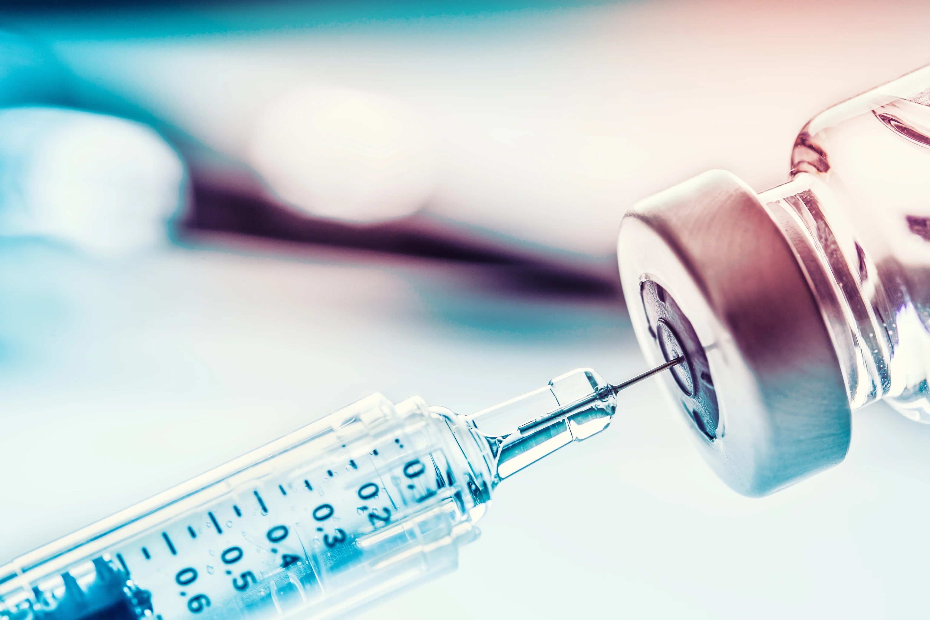 Close-up medical syringe with a vaccine.