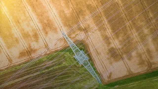 Birds eye view of a pylon and the landscape.