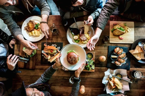 Group of friends eating together