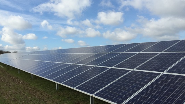 Solar panel under cloudy sky